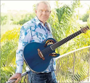  ?? AP PHOTO ?? In this July 27, 2011 photo, musician Glen Campbell poses for a portrait in Malibu, Calif. His daughter says his last record “Adios” was therapeuti­c for the ailing Grammy winner.