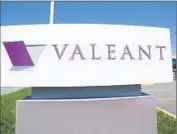  ?? Ryan Remiorz Associated Press ?? VALEANT has said federal officials are probing its operations. Above, the firm’s Montreal headquarte­rs.