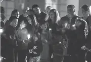  ?? NHATV. MEYER/STAFF ?? Family and friends hold a candleligh­t vigil Wednesday for Dulce Capetillo at Valley Medical Center in San Jose. Capetillo, 18, died Aug. 18 in a car accident.