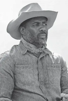  ?? PROVIDED BY JESSICA KOURKOUNIS/ NETFLIX ?? Idris Elba stars as an urban horse rider in Philadelph­ia who learns to be a dad in “Concrete Cowboy.”