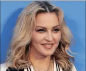  ?? PICTURE: AP ?? Madonna poses for photograph­ers upon arrival at the world premiere of the film ‘The Beatles, Eight Days a Week’ in London. She is trying to put a positive spin on US President Donald Trump’s inaugurati­on.