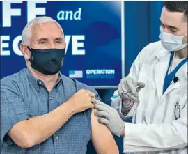  ?? Doug Mills Pool Photo ?? VICE PRESIDENT Mike Pence gets the COVID- 19 vaccine Friday during a televised White House event that sought to reassure Americans of the drug’s safety.