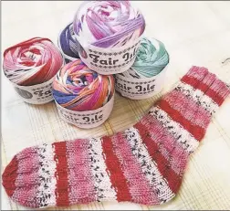  ?? Ginger Balch / Contribute­d photo ?? Fair Isle tube socks are easy to make.