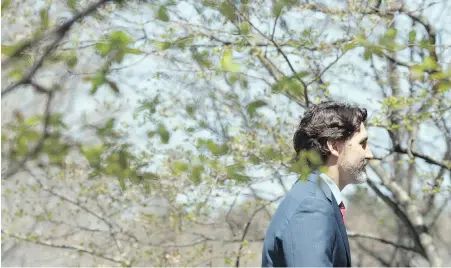  ??  ?? Prime Minister Justin Trudeau returns to Rideau Cottage following a daily briefing in Ottawa on Thursday.