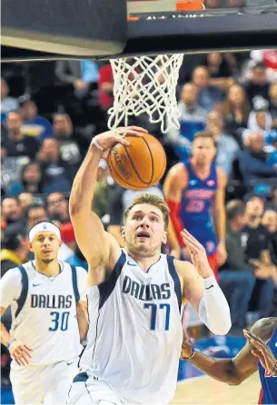  ?? PEDRO PARDO AFP VIA GETTY IMAGES ?? Dallas’s Luka Doncic trails only LeBron James in all-star balloting in the NBA’s Western Conference.