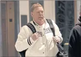  ?? ADAM HUNGER — THE ASSOCIATED PRESS ?? Mark Davis, owner of the Las Vegas Raiders, leaves the NFL owners meeting in New York on Wednesday.