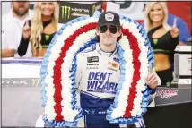  ??  ?? Ryan Blaney celebrates at Victory Lane after winning a NASCAR Cup Series auto race at Talladega Superspeed­way on Oct 14 in Talladega,
Alabama. (AP)