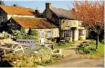  ??  ?? James and Tommy Banks, top with parents Tom and Anne, run The Black Swan pub, above, in Oldstead, near Thirsk, N Yorks