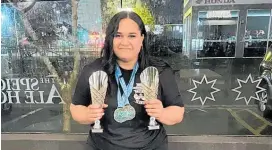  ?? ?? Taranaki woman Ashleigh Hoeta has broken the world bench press record.