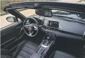  ?? FIAT ?? The 124 Spider’s cockpit is very similar to that of Mazda’s MX-5.