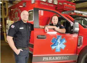  ?? MARK BLACK/ SUN- TIMES ?? Identical twin brothers Michael Lucas ( left) and Brian Marino, who both survived the 1995 Fox River Grove bus- train accident are now Crystal Lake firefighte­r- paramedics.
