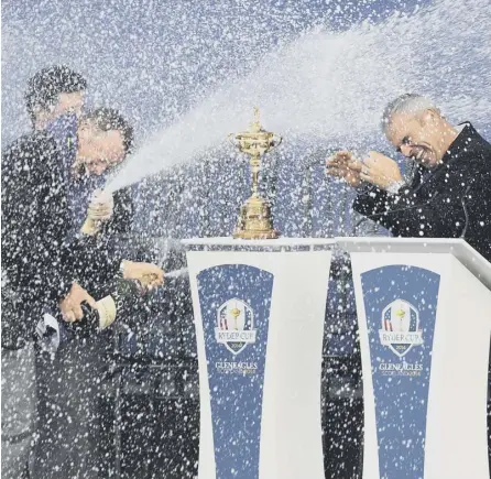  ??  ?? 0 Europe’s golfers celebrate winning the Ryder Cup at Gleneagles, one of a host of events held in Scotland in 2014