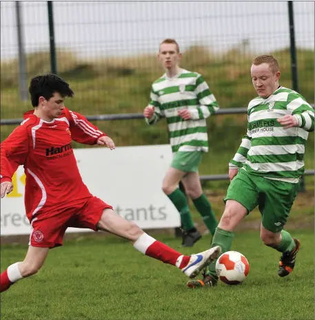  ??  ?? Kyle Harrigan, Strand Celtic and Shane Regan, Ballymote in action at the weekend. Ballymote Celtic won 4- 3. Pic: Carl Brennan.