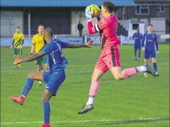  ?? Picture: Keith Davy ?? Ashford keeper
Sam Mott collects the ball during the 2-2 draw with Herne Bay on Saturday