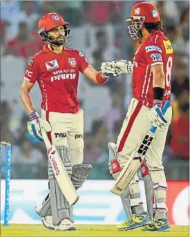  ??  ?? On Sunday, Manan Vohra (left) and Murali Vijay struck a 97-run opening partnershi­p to set a platform for Kings XI Punjab to chase down the target of 153.