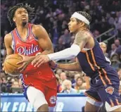  ?? Frank Franklin II Associated Press ?? TYRESE MAXEY of the 76ers, left, was fouled late in Game 2 against Miles McBride and the Knicks.