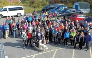  ?? JONATHAN PARSONS/THE PACKET ?? Hundreds gathered in Clarenvill­e Wednesday for the first annual ‘A Mile in His Shoes’ walk. The event was held in memory of RCMP Cpl. Trevor O’keefe, who died last month, and other first responders who face PTSD and other mental health challenges. The...