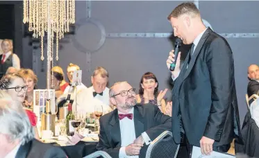  ?? Patient Carl Horribin is interviewe­d about his experience­s at The Clatterbri­dge Cancer Centre at the Charity Diamond Ball Pictures: GAVIN TRAFFORD ??