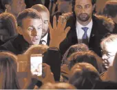  ?? LUDOVIC MARIN/GETTY-AFP ?? French President Emmanuel Macron greets crowds ahead of ceremonies marking the 100th anniversar­y of WWI.