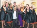  ??  ?? Atty Hussein, pictured behind Gary Barlow, with her friends at her birthday party