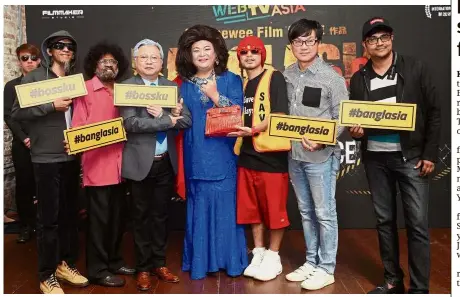  ??  ?? In cinemas soon: Namewee (third from right) and producer Fred Chong (second from right) posing with cast members during the press conference to announce the release of the film at Jao Tim cafe in Kuala Lumpur.