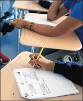  ?? YANA PASKOVA/THE NEW YORK TIMES ?? Students in an SAT preparatio­n course in New York, March 1, 2016.