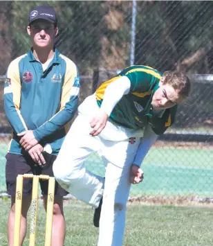  ??  ?? Hallora/Ellinbank’s Will Gown bowls during the under 16 match against Warragul.