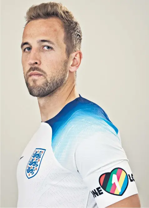  ?? ?? Harry Kane wears a football shirt emblazoned with the ‘Onelove’ campaign logo in criticism of the treatment of migrant workers, LGBTQ+ communitie­s and women in Qatar