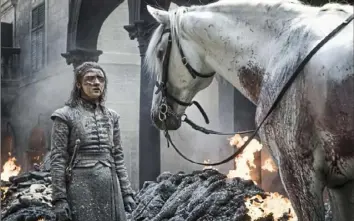  ?? Helen Sloan/HBO ?? Arya Stark (Maisie Williams) meets a pale horse in the rubble of King’s Landing. The “Game of Thrones” finale is Sunday.