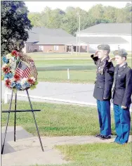  ?? PHOTO SUBMITTED BY MAJOR GRIFFTHS ?? Members of McDonald County High School JROTC honor the service and memory of former MCHS graduate PFC Chris Marion.
