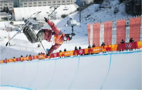  ?? PHOTOS: MARTIN BUREAU/AFP/GETTY IMAGES ?? Canada’s Cassie Sharpe competes in the women’s ski halfpipe final during the Pyeongchan­g 2018 Winter Olympic Games on Feb. 20. Canada had skiers at fifth and sixth in men’s halfpipe and had other close calls in men’s and women’s ski slopestyle.