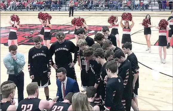  ?? Photograph­s courtesy of Keith Allison ?? Pea Ridge Blackhawk cheerleade­rs led Blackhawk fans in cheers during a time out while coaches talked strategy with players.