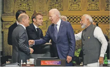  ?? GETTY IMAGES ?? Izquierda a Derecha.El canciller Olaf Scholz de Alemania, el presidente Emmanuel Macron de Francia, el presidente Joe Biden de Estados Unidos y el primer ministro Narendra Modi de India conversan antes de una sesión de trabajo sobre seguridad alimentari­a y energética durante G20. /