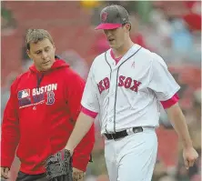  ?? STAff PHOTO By nAncy LAne ?? EARLY EXIT: Drew Pomeranz leaves Sunday’s game after warming up for the fourth inning.