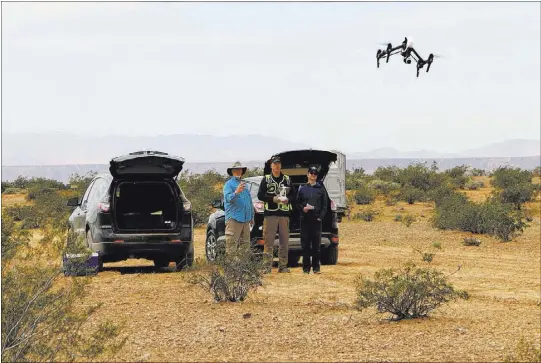  ?? PHOTOS By MARK BARKER/NIAS ?? The Nevada Institute for Autonomous Systems, partnering with Embry-Riddle, conducted drone flight operations March 21 and 22 at a test range over uninhabite­d desert near Mesquite. The range is one of 30 establishe­d in Nevada support the state’s growing...
