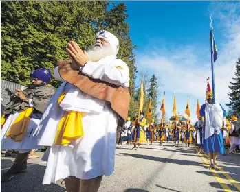  ?? FRANCIS GEORGIAN ?? An estimated half-million people from all over the world visited Surrey on Sunday to take in the Vaisakhi parade celebratin­g the coming of a new year on the Sikh calendar