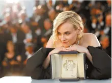  ?? Reuters-Yonhap ?? Actress Diane Kruger, winner of the Best Actress Award for the film “In The Fade,” poses during a photocall at the 70th Cannes Film Festival in Cannes, France, Sunday.