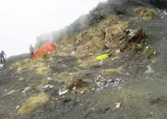  ??  ?? Rinjani's campsites are covered in litter ( Image by Harry Vasiliadis)
