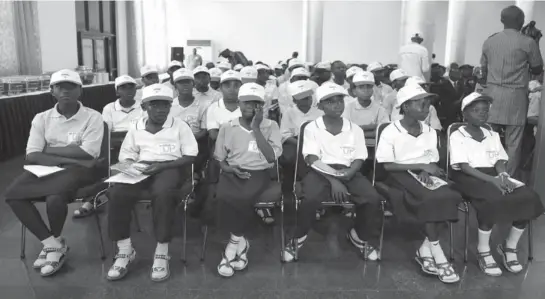  ?? PHOTO: GODSWILL ?? Pupils of Junior Secondary School, Galadimawa participat­ing at the 2013 Internatio­nal Day for Disaster Reduction (IDDR) programme organised by National Emergency Management Agency (NEMA) in Abuja, yesterday.