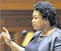 ?? BOB ANDRES / BANDRES@AJC.COM ?? Democrat Stacey Abrams has garnered national attention in her bid to become the nation’s first female African-American governor. She resigned from the Georgia House in her bid to take the state’s top office.