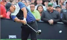  ?? AP-Charles Krupa ?? Brooks Koepka hits off the 16th tee during the final round of the tournament at Bethpage Black in Farmingdal­e, N.Y., on Sunday.