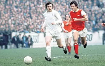  ??  ?? Peter Lorimer up against fellow Scot, Frank McLintock of Arsenal, at Elland Road in 1972