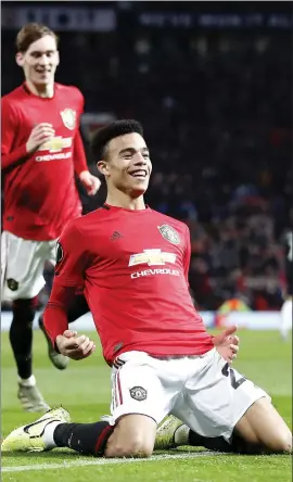  ??  ?? Mason Greenwood celebrates his second goal of the night