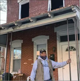  ?? PHOTO COURTESY OF NORRISTOWN FIRE DEPARTMENT ?? Jimmy “The Cowboy” Johnson, pictured here at the fire scene, will be recognized by the municipali­ty at an upcoming council meeting for his heroic actions.