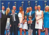  ?? Rex Features ?? US President Donald Trump with his daughter Ivanka and other family members.