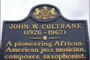  ?? MATT ROURKE — THE ASSOCIATED PRESS ?? This photos shows an historic marker posted outside the former home of jazz musician John Coltrane in Philadelph­ia, Monday.