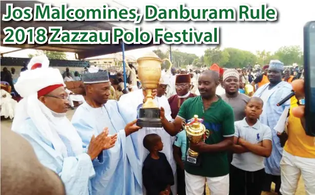  ??  ?? Jos Malcomines Captain, Sadiq Garba receives the Emir of Zazzau Cup from the Nigerian Polo Federation President, Francis Ogboro at a colourful closing ceremony that brought down the curtain on the 2018 Zaria internatio­nal polo tournament in Zaria last...