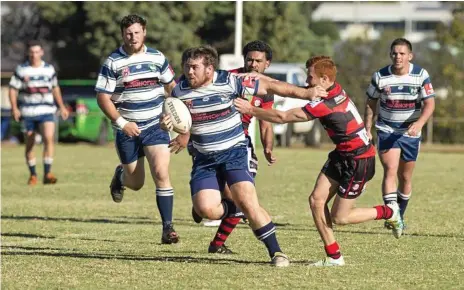  ?? Photo: Nev Madsen ?? BROTHERS AT ARMS: Ricky Davies on the attack for Brothers against Valleys in last season’s TRL competitio­n.