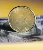 ?? BLOOMBERG ?? The value of the loonie is no longer as tied in to Canadian oil prices as it once was, analysts say.
