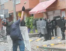  ??  ?? Estudiante­s se manifestar­on contra el presidente de Colombia, Iván Duque, el pasado 22 de febrero.